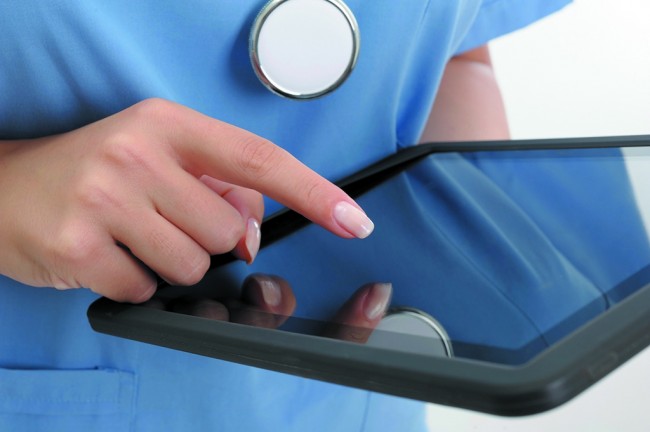 Doctor holding digital tablet